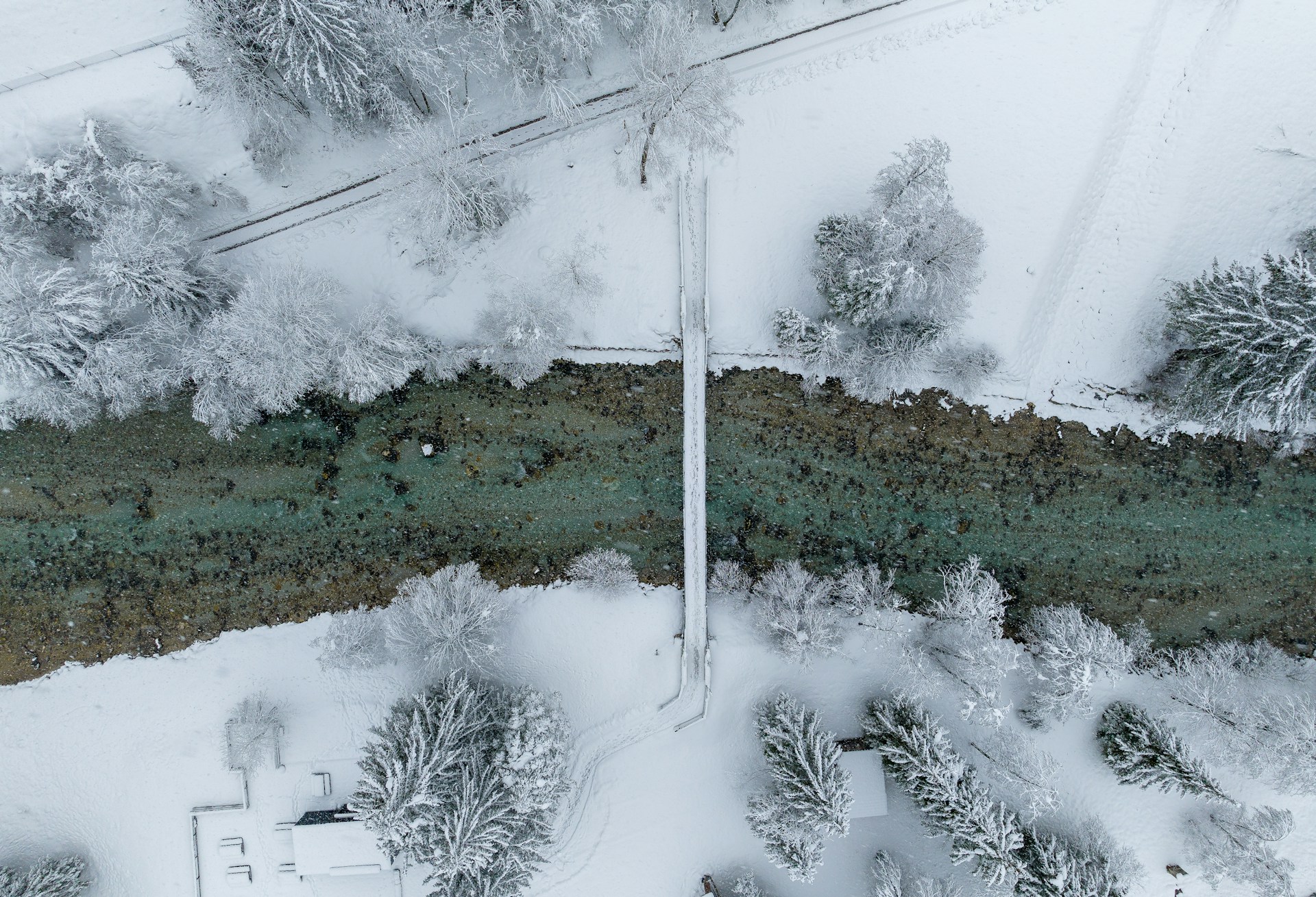 an aerial view of snow covered property